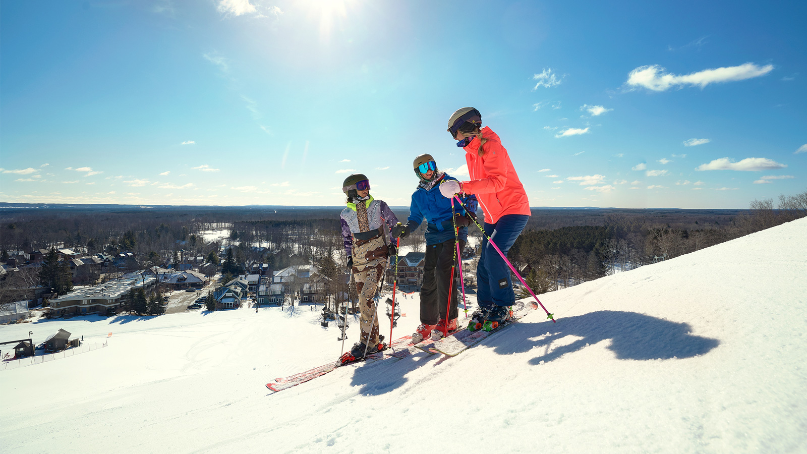 Three friends on the ski slopes.