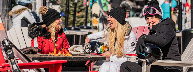 Spring Break Skiers at fire pit