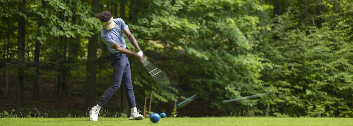 Golfer on Mountain Ridge