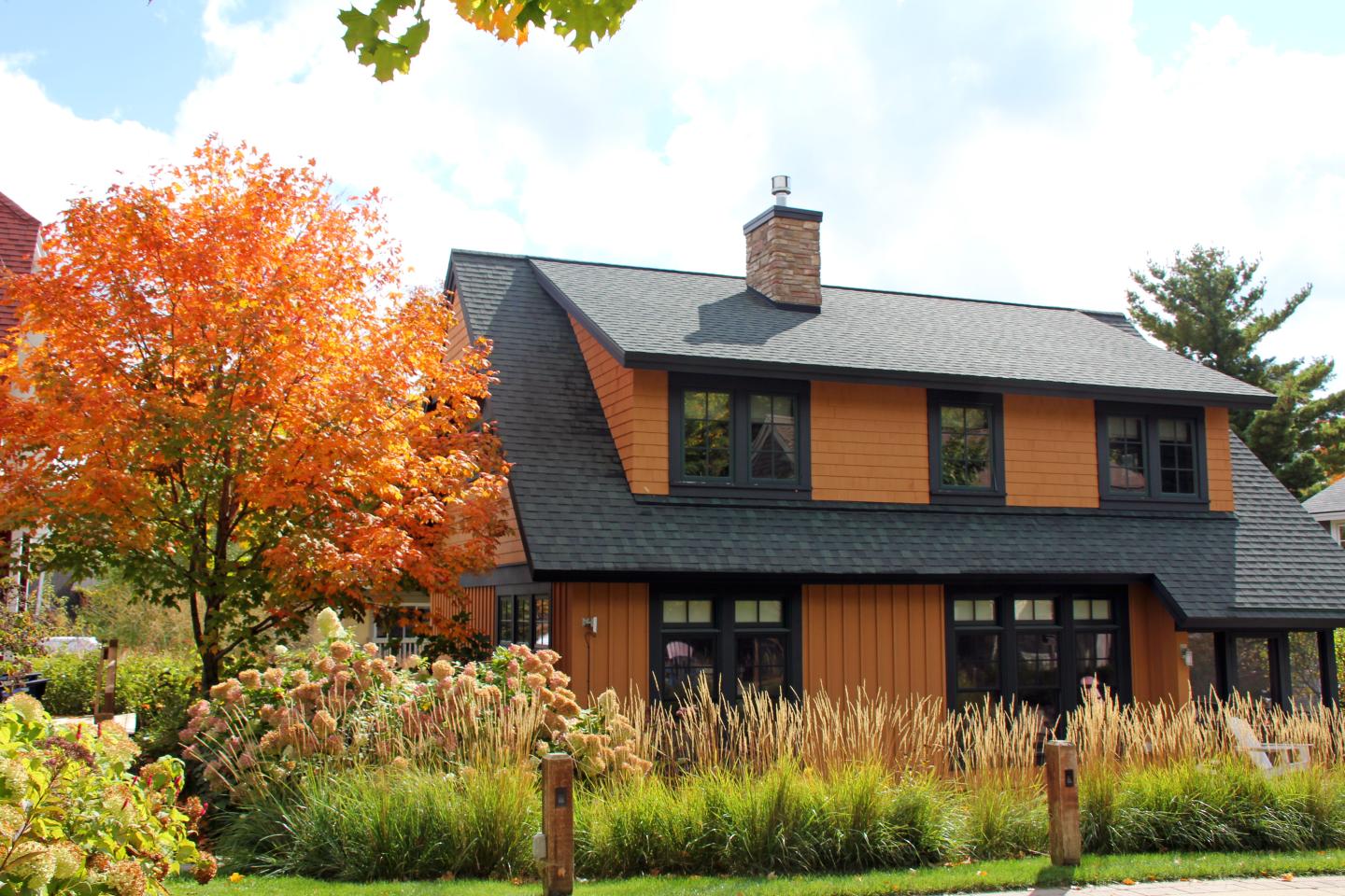 Bungalows at Crystal Glen and autumn tree nearby.