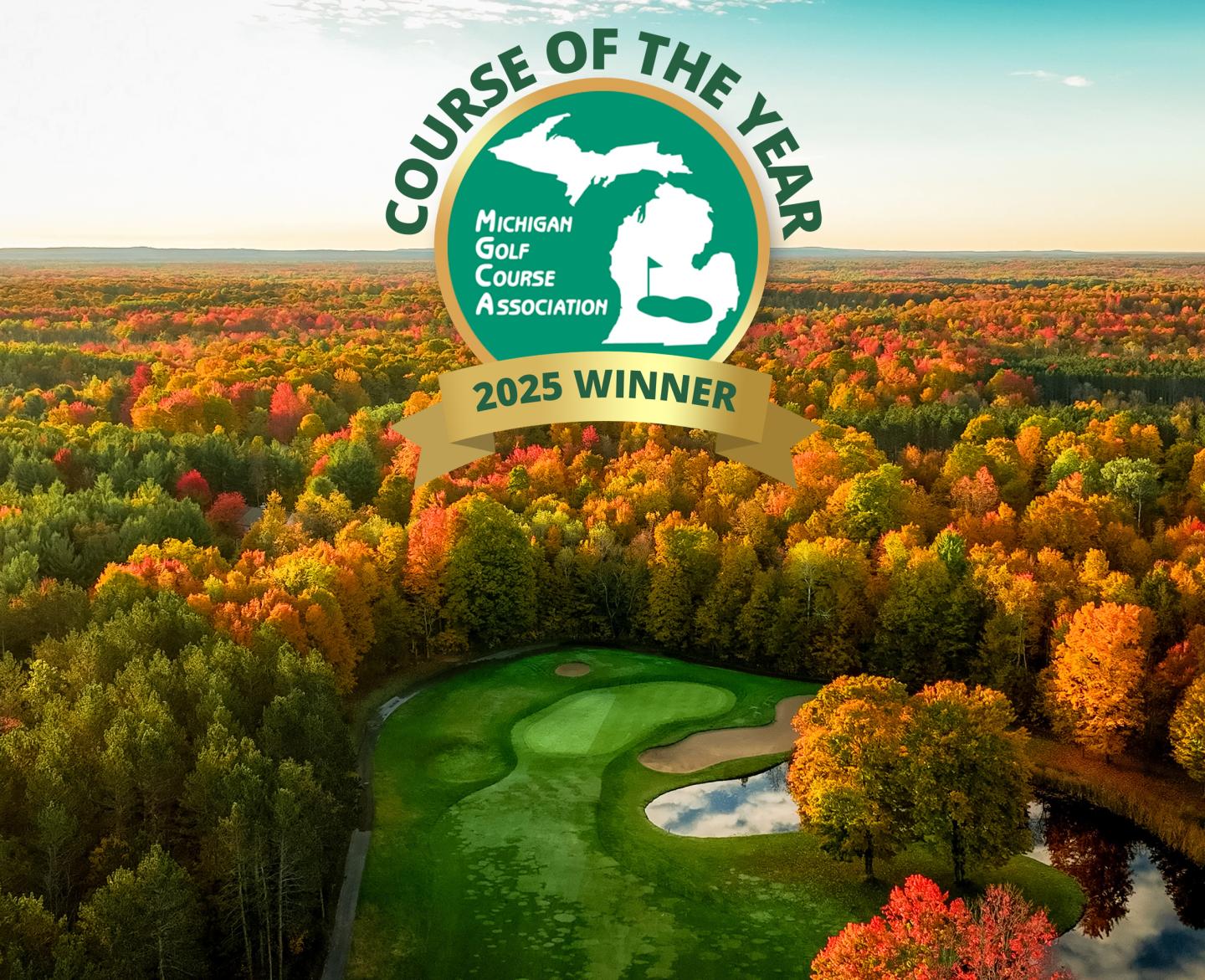 Autumn aerial view of a golf course surrounded by colorful trees with an award logo overlay for Course of the Year.